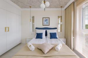 Katil atau katil-katil dalam bilik di Apartament Porto - Park Reagana