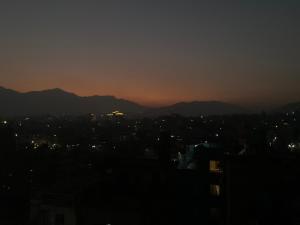 Nespecifikovaný výhled na hory nebo výhled na hory při pohledu z ubytování v soukromí + 2 fotografie