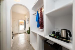 Kuchyň nebo kuchyňský kout v ubytování Amaze Suites