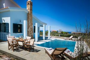 The swimming pool at or close to Seirios Luxury Villa