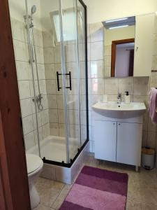 Koupelna v ubytování Apartments Mato