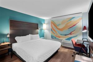 Tru By Hilton Wauseon客房内的一张或多张床位