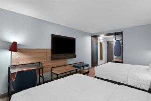 Tru By Hilton Wauseon客房内的一张或多张床位