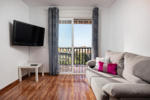 Μια τηλεόραση ή/και κέντρο ψυχαγωγίας στο Palmeras Benalmadena by Alfresco Stays