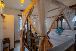 Postel nebo postele na pokoji v ubytování Zenji Hotel