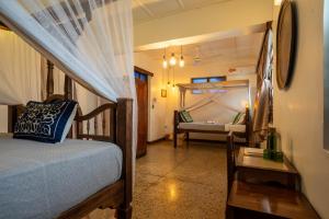 Postel nebo postele na pokoji v ubytování Zenji Hotel
