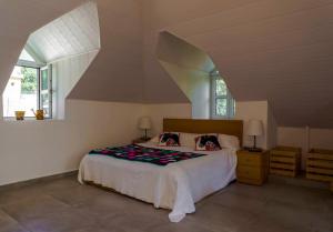 En eller flere senge i et værelse på La Mounia Kobayat