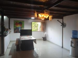 TV a/nebo společenská místnost v ubytování Casa de praia Milton JR