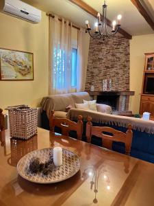 Posezení v ubytování Torcales del Lobo Apartamentos Rurales