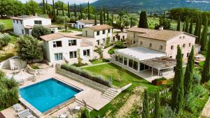 an aerial view of a house with a swimming pool at Borgo del Lago in San Gemini