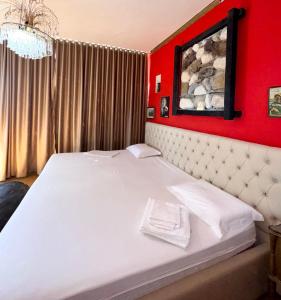 Postel nebo postele na pokoji v ubytování Hotel Vila "Oda E Miqve"