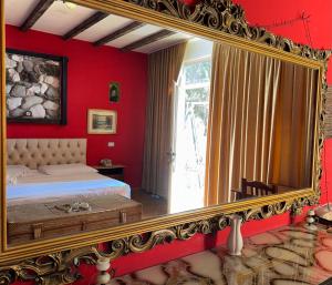 Postel nebo postele na pokoji v ubytování Hotel Vila "Oda E Miqve"