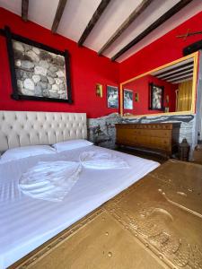 Postel nebo postele na pokoji v ubytování Hotel Vila "Oda E Miqve"
