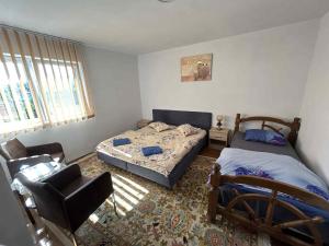 Postel nebo postele na pokoji v ubytování Casa Maksai
