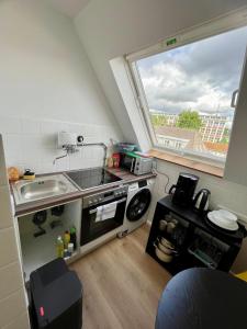 Dapur atau dapur kecil di Gemütliche 1 Zimmer Wohnung für 2 Personen