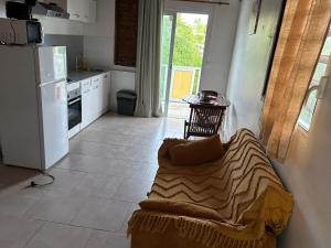 Kuchyň nebo kuchyňský kout v ubytování Charmant studio avec vue mer à Le Gosier de 22 m²