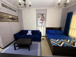 Φωτογραφία από το άλμπουμ του Blue Large Studio Apartment for 4 σε Sharjah