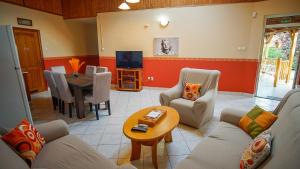 TV a/nebo společenská místnost v ubytování Zam-Zem Holiday Apartman