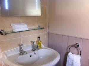 Ένα μπάνιο στο Burcott Mill Guesthouse