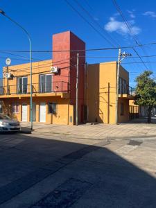 an empty street in front of a building at Departamento chivilcoy 2 in Chivilcoy