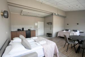 Kuchyň nebo kuchyňský kout v ubytování Skýjaborg Apartments + 37 fotografií