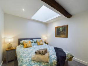 Katil atau katil-katil dalam bilik di Joiners cottage