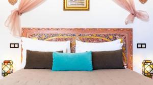 Postel nebo postele na pokoji v ubytování Riad 4 Jardins & Spa