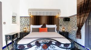 Postel nebo postele na pokoji v ubytování Riad 4 Jardins & Spa