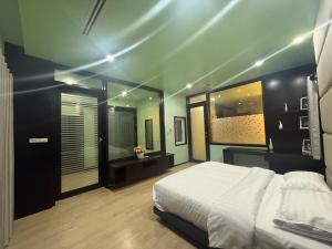 Ένα ή περισσότερα κρεβάτια σε δωμάτιο στο The Green House Pool Villa Udonthani +11 φωτογραφίες