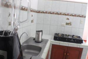 Kuchyň nebo kuchyňský kout v ubytování Casa rutz cusco