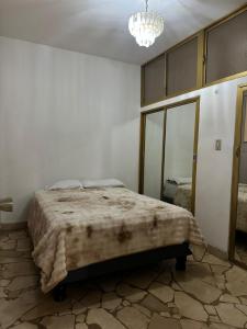 Postel nebo postele na pokoji v ubytování Suiteroom Garzota