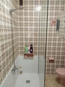 a shower with a glass door in a bathroom at Holiday home in Santa Cruz de Tenerife