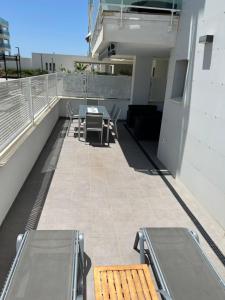 A balcony or terrace at Duna Beach - Infinity Pool