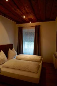 Posteľ alebo postele v izbe v ubytovaní Apartment Enzinger