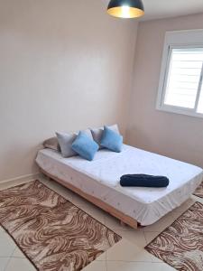 Postel nebo postele na pokoji v ubytování اقامة Rayhana + 37 fotografií