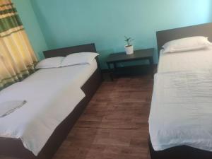 Postel nebo postele na pokoji v ubytování Ruru Riverside Hotel + 3 fotografie