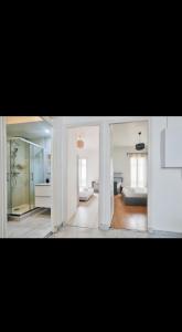 a view of a room with a bedroom and a bed at Appartement 3 pièces in Nice