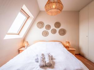 Postel nebo postele na pokoji v ubytování Apartment Residentie Irena app-302 by Interhome