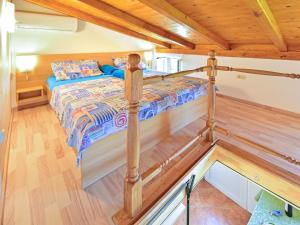 Postel nebo postele na pokoji v ubytování Holiday Home Karolina by Interhome