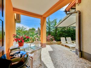 Balkón nebo terasa v ubytování Holiday Home Karolina by Interhome