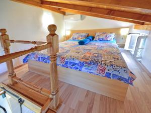 Postel nebo postele na pokoji v ubytování Holiday Home Karolina by Interhome