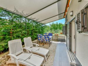 Balkón nebo terasa v ubytování Holiday Home Karolina by Interhome