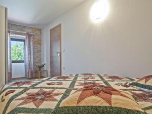 Postel nebo postele na pokoji v ubytování Holiday Home Mila by Interhome
