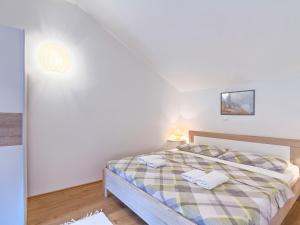 Postel nebo postele na pokoji v ubytování Holiday Home Mila by Interhome