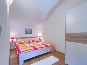 Postel nebo postele na pokoji v ubytování Holiday Home Mila by Interhome