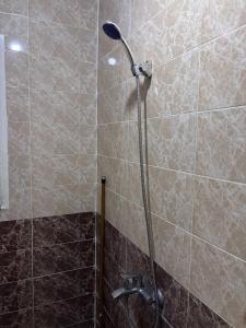 Koupelna v ubytování Noor Hotel