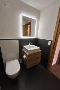 Koupelna v ubytování Apartment Gletscherhorn II - Tapia by Interhome