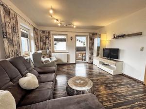 Televízia a/alebo spoločenská miestnosť v ubytovaní Apartment Hannah Lena by Interhome
