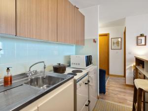 Kuchyň nebo kuchyňský kout v ubytování Apartment Bruyères A32 by Interhome