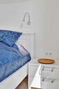 Postel nebo postele na pokoji v ubytování Holiday Home Ferienhaus Bude 92 by Interhome